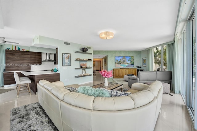 6051 N Ocean Dr Unit 404, Hollywood, FL 33019 - living area featuring light tile patterned floors