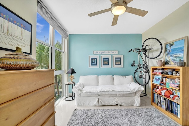 6051 N Ocean Dr Unit 404, Hollywood, FL 33019 - living area featuring healthy amount of natural light and ceiling fan