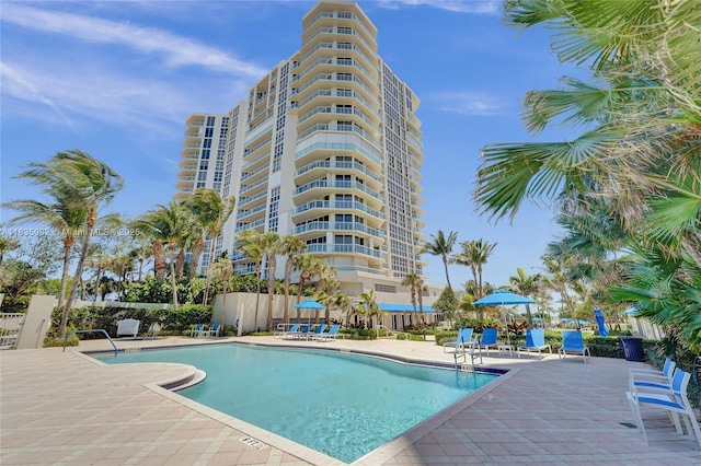 6051 N Ocean Dr Unit 404, Hollywood, FL 33019 - community pool featuring a patio area