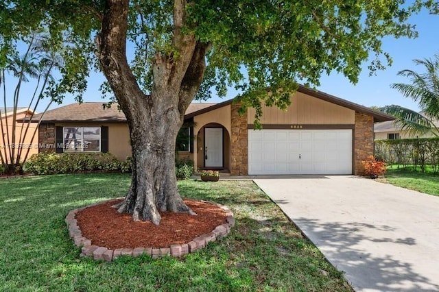 6858 S Congress Ave, Lake Worth, FL 33462 - view of front of property featuring stone siding, a garage, a front lawn, and driveway