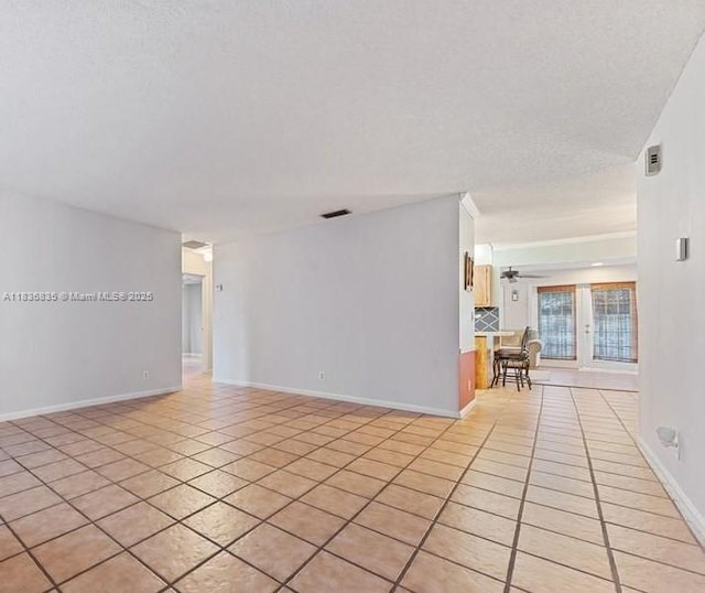 6858 S Congress Ave, Lake Worth, FL 33462 - spare room featuring light tile patterned flooring and a ceiling fan