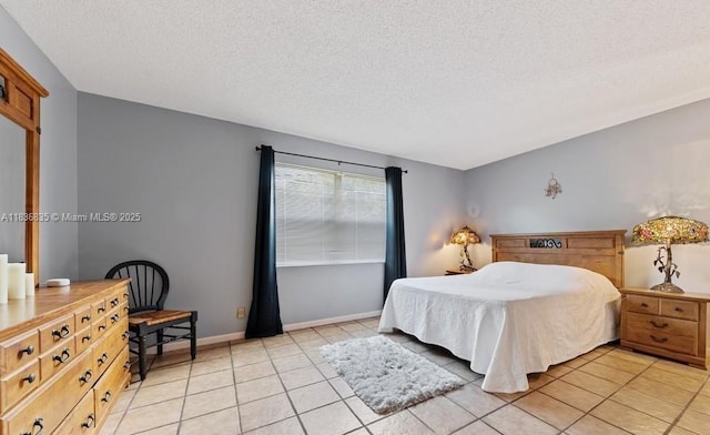 6858 S Congress Ave, Lake Worth, FL 33462 - bedroom featuring a textured ceiling and light tile patterned floors