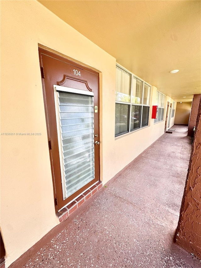 9021 Sunrise Lakes Blvd Unit 104, Sunrise, FL 33322 - property entrance with stucco siding