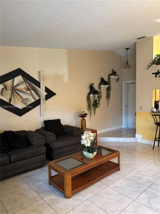 11248 SW 11th St, Pembroke Pines, FL 33025 - living area featuring a textured ceiling and baseboards