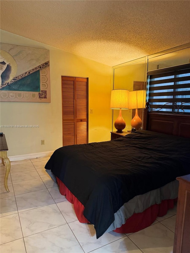 11248 SW 11th St, Pembroke Pines, FL 33025 - bedroom with a textured ceiling, a closet, vaulted ceiling, and light tile patterned floors