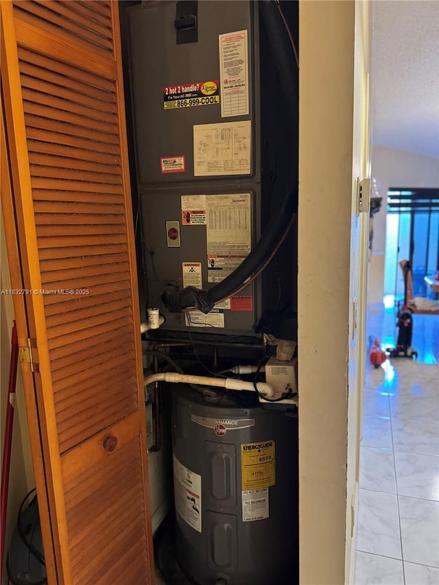 11248 SW 11th St, Pembroke Pines, FL 33025 - utility room with water heater and heating unit