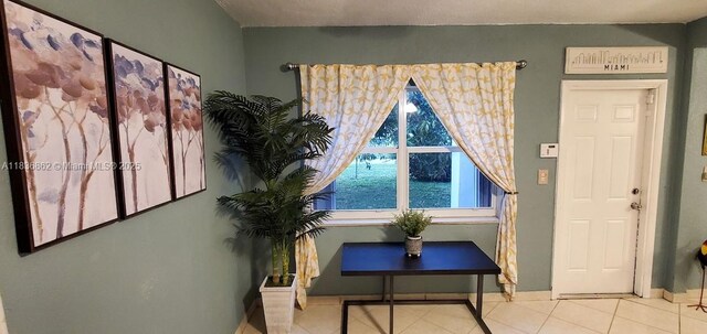 1679 NE 175th St, North Miami Beach, FL 33162 - tiled dining space with baseboards