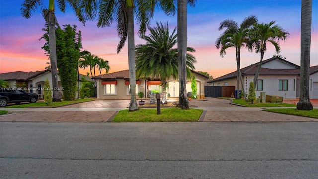 8775 NW 168th St, Miami Lakes, FL 33018 - view of front of home featuring driveway and stucco siding