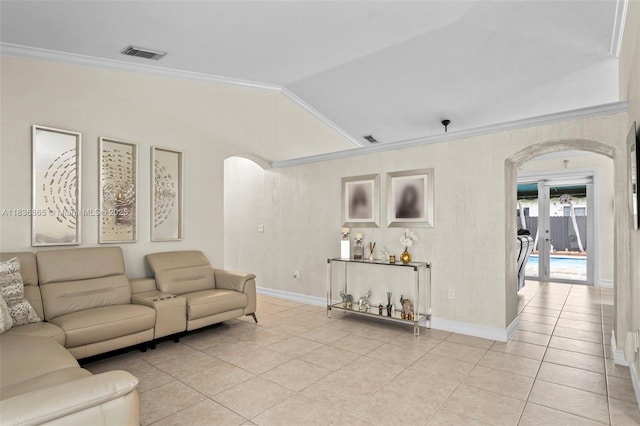 8775 NW 168th St, Miami Lakes, FL 33018 - living area featuring arched walkways, light tile patterned floors, crown molding, and lofted ceiling