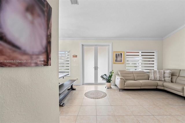 8775 NW 168th St, Miami Lakes, FL 33018 - living area featuring french doors, plenty of natural light, crown molding, and light tile patterned floors