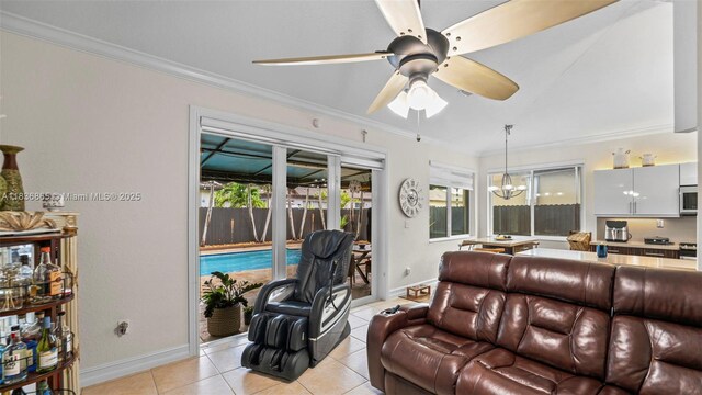 8775 NW 168th St, Miami Lakes, FL 33018 - living area with crown molding, light tile patterned floors, ceiling fan, and a chandelier