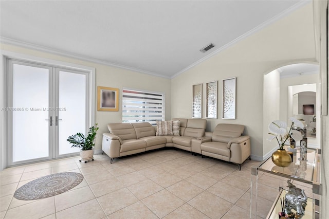 8775 NW 168th St, Miami Lakes, FL 33018 - living area with vaulted ceiling, light tile patterned flooring, arched walkways, ornamental molding, and french doors