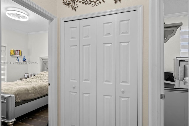 8775 NW 168th St, Miami Lakes, FL 33018 - bedroom featuring ornamental molding, dark wood finished floors, and a closet