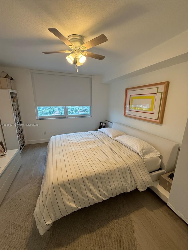2665 SW 37th Ave Unit 1213, Miami, FL 33133 - bedroom featuring wood finished floors and a ceiling fan