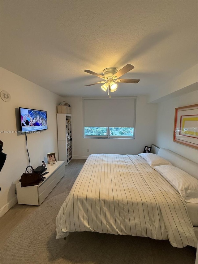 2665 SW 37th Ave Unit 1213, Miami, FL 33133 - bedroom featuring a ceiling fan and baseboards