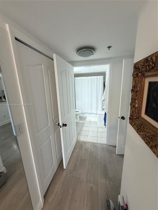 2665 SW 37th Ave Unit 1213, Miami, FL 33133 - hallway featuring wood finished floors