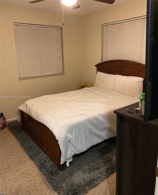 1549 SE 24th Ct Unit 225, Homestead, FL 33035 - carpeted bedroom featuring ceiling fan and baseboards