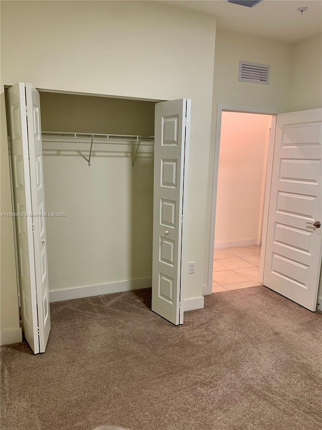 10455 NW 82nd St Unit 33, Doral, FL 33178 - unfurnished bedroom with carpet floors and a closet
