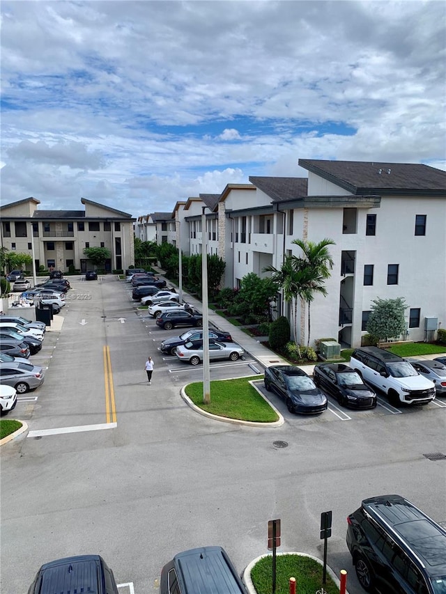 10455 NW 82nd St Unit 33, Doral, FL 33178 - uncovered parking lot with a residential view