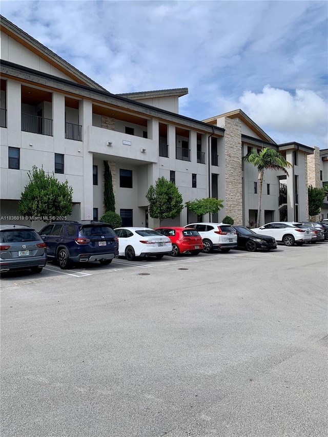 10455 NW 82nd St Unit 33, Doral, FL 33178 - view of building exterior featuring uncovered parking