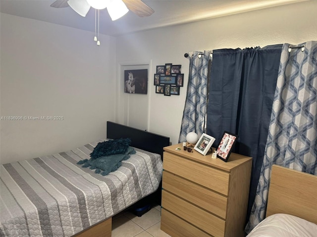 2651 NW 13th St Unit 45, Miami, FL 33125 - bedroom featuring light tile patterned flooring and a ceiling fan