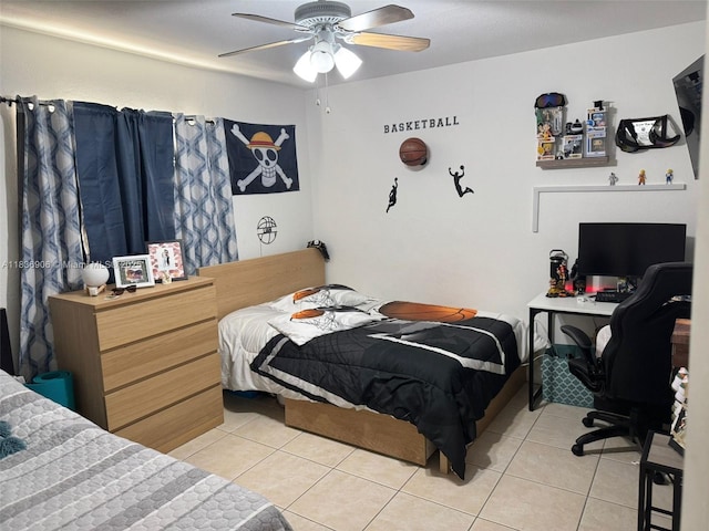 2651 NW 13th St Unit 45, Miami, FL 33125 - bedroom with light tile patterned flooring, a desk, and ceiling fan