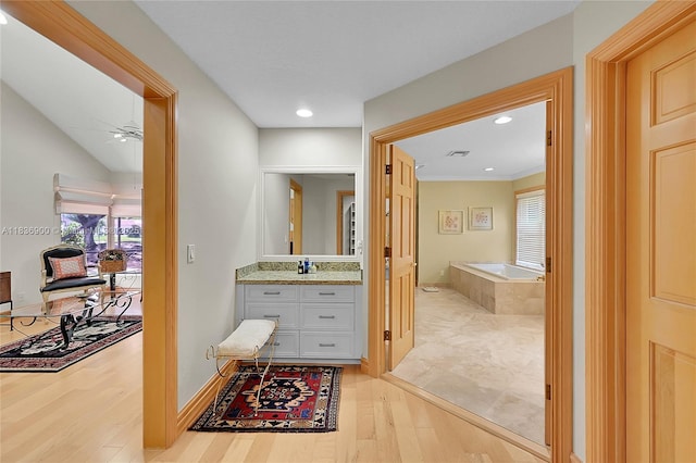 1910 Preston Trl, Coral Springs, FL 33071 - bathroom featuring plenty of natural light, vanity, a garden tub, a ceiling fan, and recessed lighting