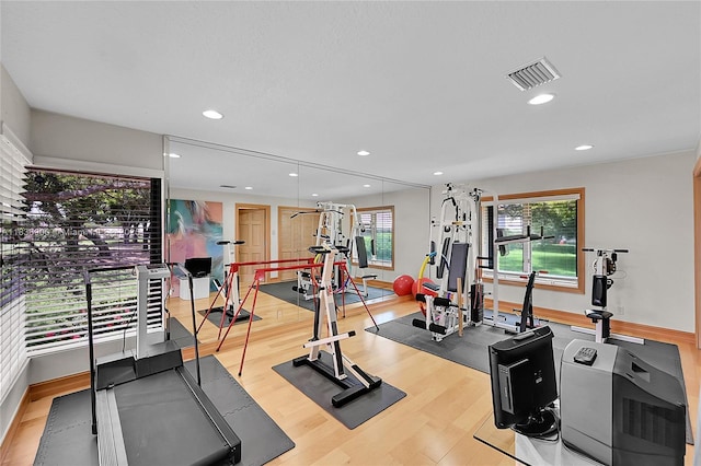 1910 Preston Trl, Coral Springs, FL 33071 - workout room with wood finished floors, plenty of natural light, and recessed lighting