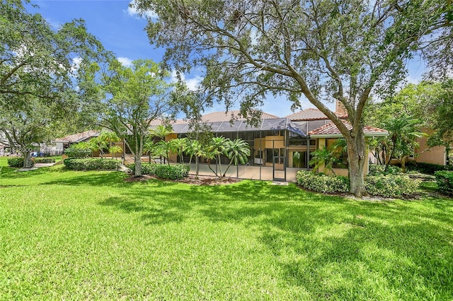 1910 Preston Trl, Coral Springs, FL 33071 - view of green lawn with glass enclosure