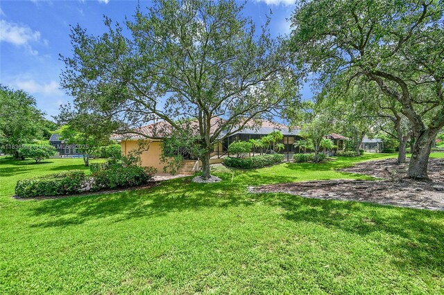 1910 Preston Trl, Coral Springs, FL 33071 - view of grassy yard
