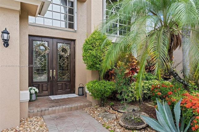 5920 NW 54th Cir, Coral Springs, FL 33067 - property entrance featuring stucco siding and french doors