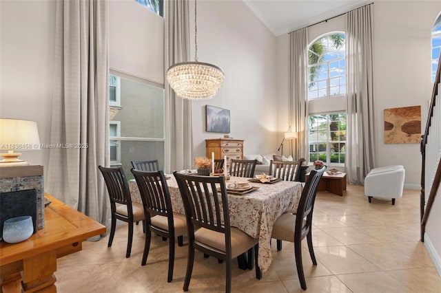 5920 NW 54th Cir, Coral Springs, FL 33067 - dining area featuring high vaulted ceiling, a chandelier, and light tile patterned floors