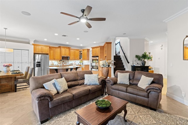 5920 NW 54th Cir, Coral Springs, FL 33067 - living room with stairs, light tile patterned flooring, a ceiling fan, ornamental molding, and recessed lighting