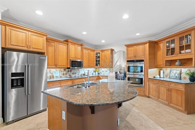 5920 NW 54th Cir, Coral Springs, FL 33067 - kitchen with appliances with stainless steel finishes, brown cabinetry, dark stone counters, recessed lighting, and ornamental molding