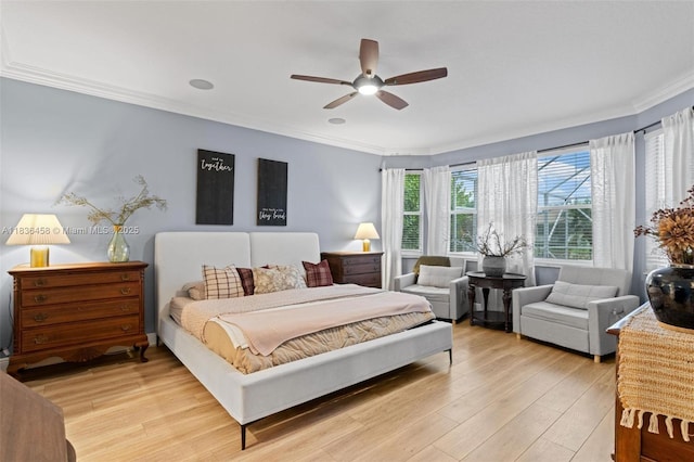 5920 NW 54th Cir, Coral Springs, FL 33067 - bedroom featuring ornamental molding, light wood-type flooring, and ceiling fan