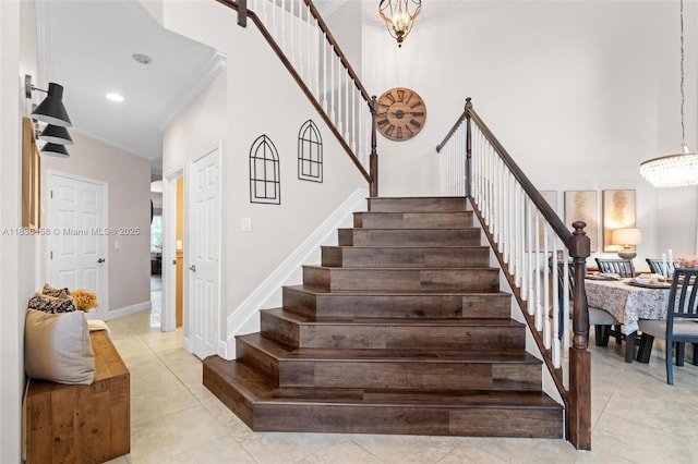 5920 NW 54th Cir, Coral Springs, FL 33067 - stairway with crown molding, tile patterned flooring, and recessed lighting
