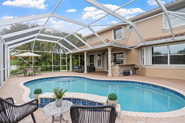 5920 NW 54th Cir, Coral Springs, FL 33067 - swimming pool featuring a patio, glass enclosure, and a ceiling fan