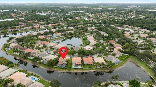 5920 NW 54th Cir, Coral Springs, FL 33067 - aerial view of property and surrounding area with nearby suburban area and a nearby body of water