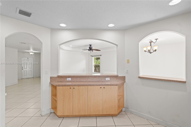 955 S 26th Ave, Hollywood, FL 33020 - kitchen featuring light brown cabinets, ceiling fan, light tile patterned flooring, recessed lighting, and a textured ceiling