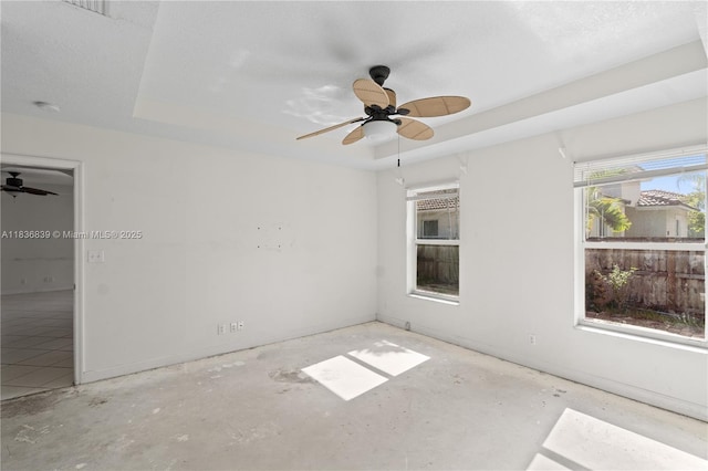 955 S 26th Ave, Hollywood, FL 33020 - empty room with a ceiling fan, a tray ceiling, and a smoke detector