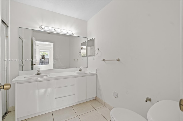 955 S 26th Ave, Hollywood, FL 33020 - bathroom featuring double vanity and tile patterned floors