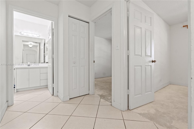 955 S 26th Ave, Hollywood, FL 33020 - corridor featuring light tile patterned floors and baseboards