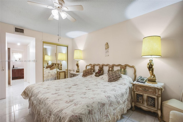 5100 Washington St Unit 211, Hollywood, FL 33021 - bedroom featuring tile patterned floors and a closet