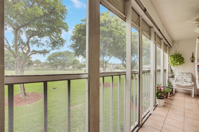 5100 Washington St Unit 211, Hollywood, FL 33021 - unfurnished sunroom with tile patterned flooring, ceiling fan, and healthy amount of natural light