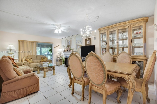 5100 Washington St Unit 211, Hollywood, FL 33021 - dining area featuring light tile patterned floors, a chandelier, and a ceiling fan