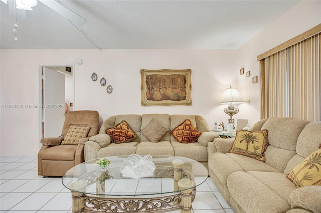 5100 Washington St Unit 211, Hollywood, FL 33021 - living area with light tile patterned floors and a ceiling fan