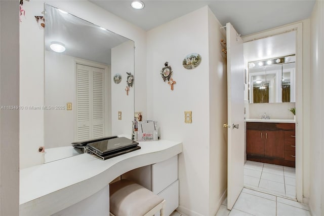 5100 Washington St Unit 211, Hollywood, FL 33021 - bathroom featuring vanity and tile patterned floors