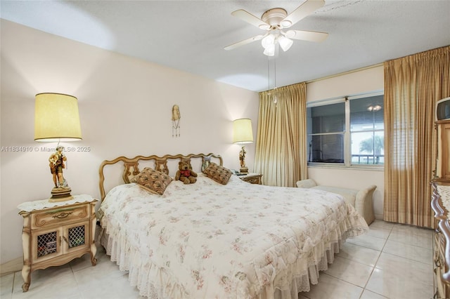 5100 Washington St Unit 211, Hollywood, FL 33021 - bedroom featuring light tile patterned floors and ceiling fan