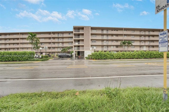 5100 Washington St Unit 211, Hollywood, FL 33021 - view of apartment building / complex featuring uncovered parking