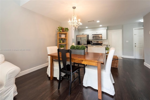 1606 Veracruz Ln, Weston, FL 33327 - dining area with a chandelier, dark wood-style floors, and recessed lighting